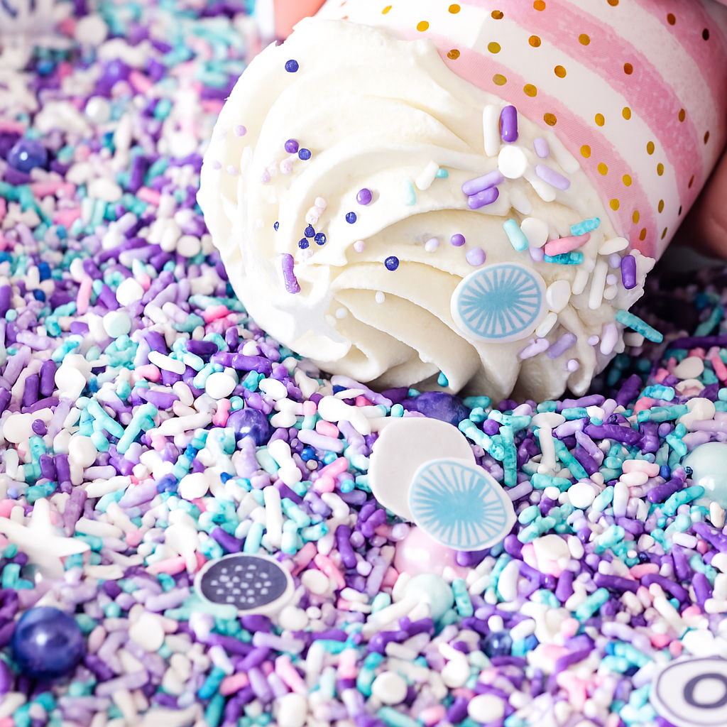DG's 31st Birthday cupcake with purple and blue sprinkles.