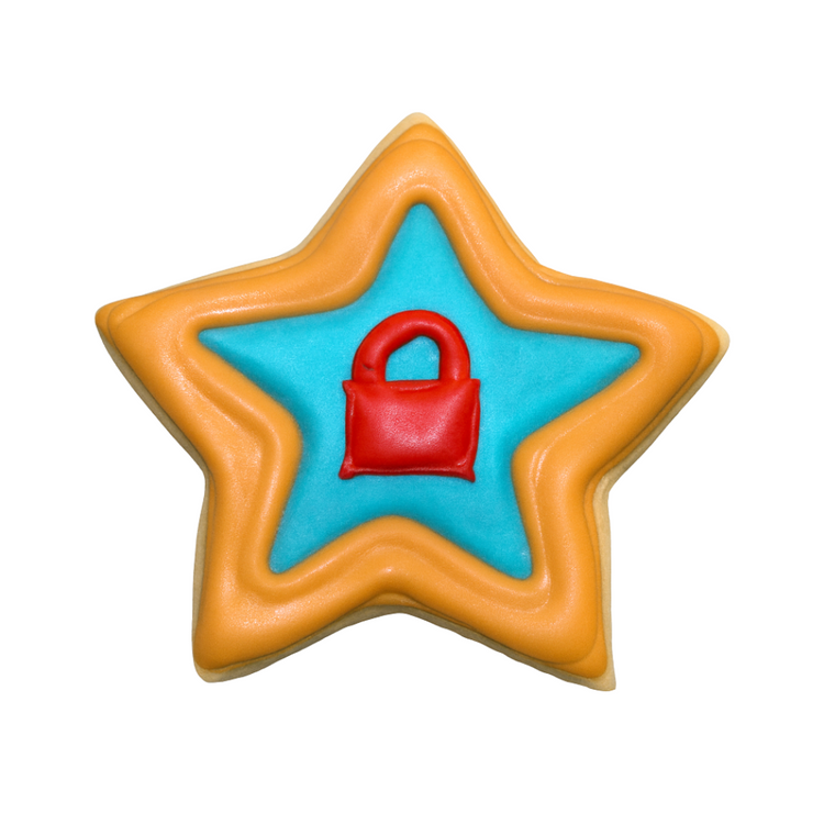 Life of a Dough Girl star cookie with a red lock design.
