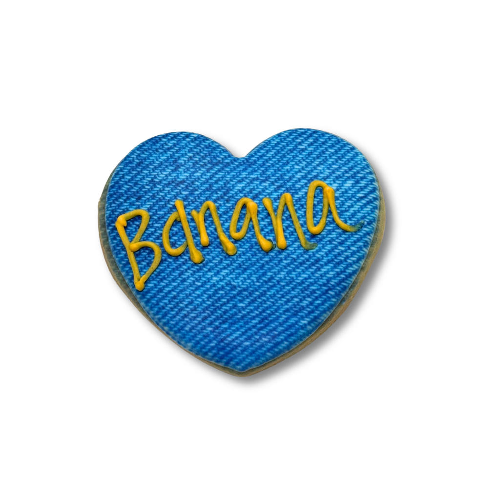 Minions heart-shaped cookie with blue denim texture and Banana text
