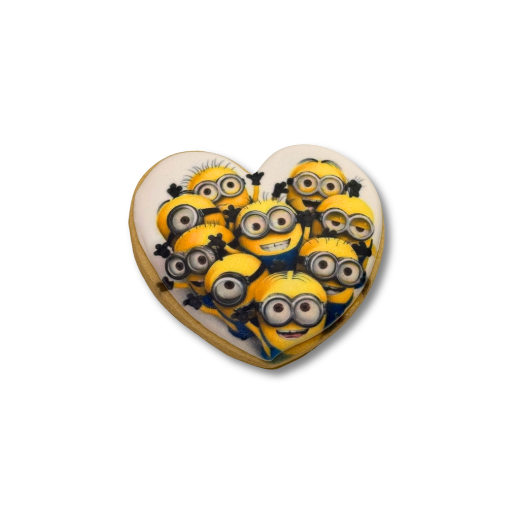 Heart-shaped Minions cookie with printed character design