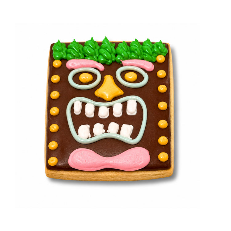 Moana tiki mask cookie with colorful icing details