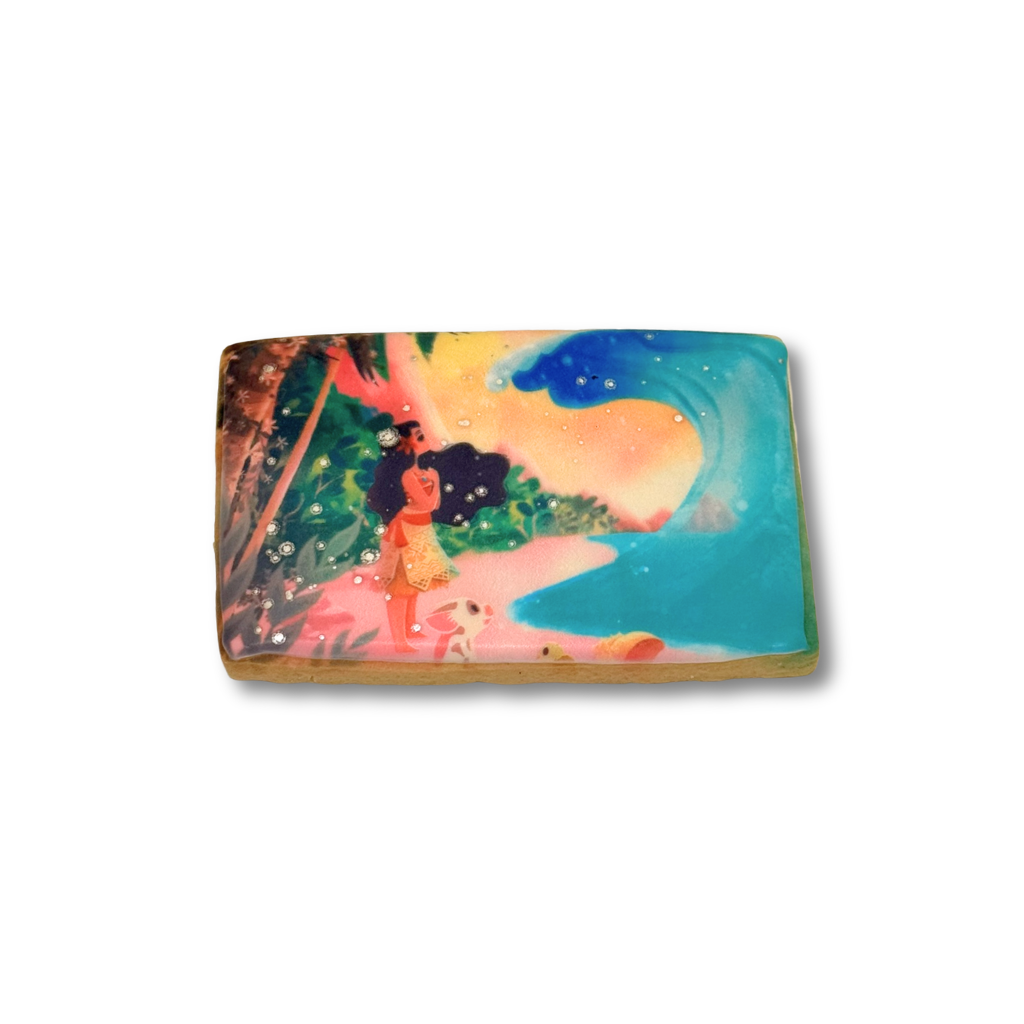 Moana cookie featuring a rectangular tropical beach scene.