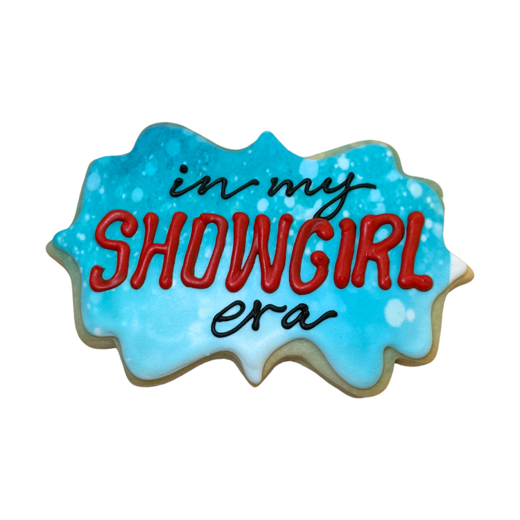 Life of a Dough Girl cookie with blue icing and red text.