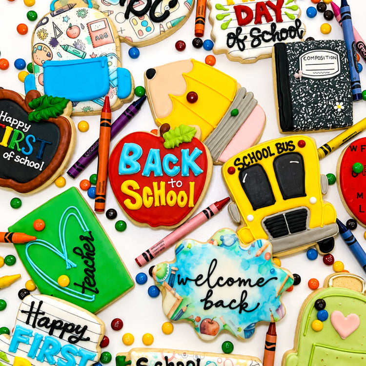 Assorted Back to School cookies with colorful icing designs.