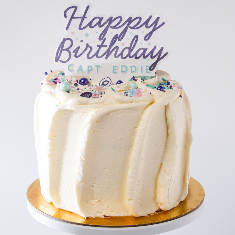 6-inch French Vanilla Cake with Happy Birthday topper.