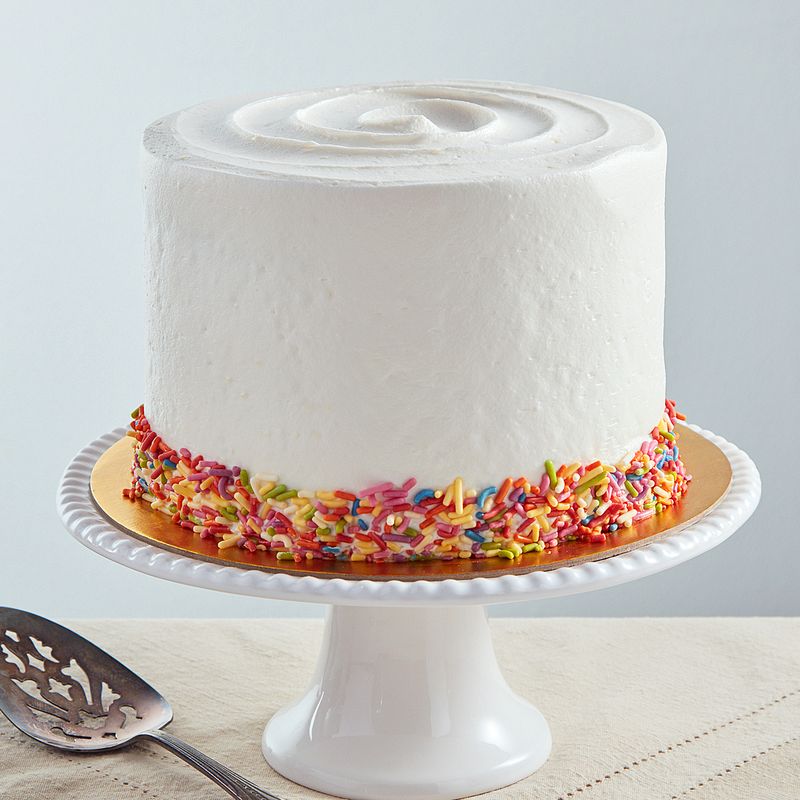 6-inch vegan French vanilla cake with colorful sprinkles.