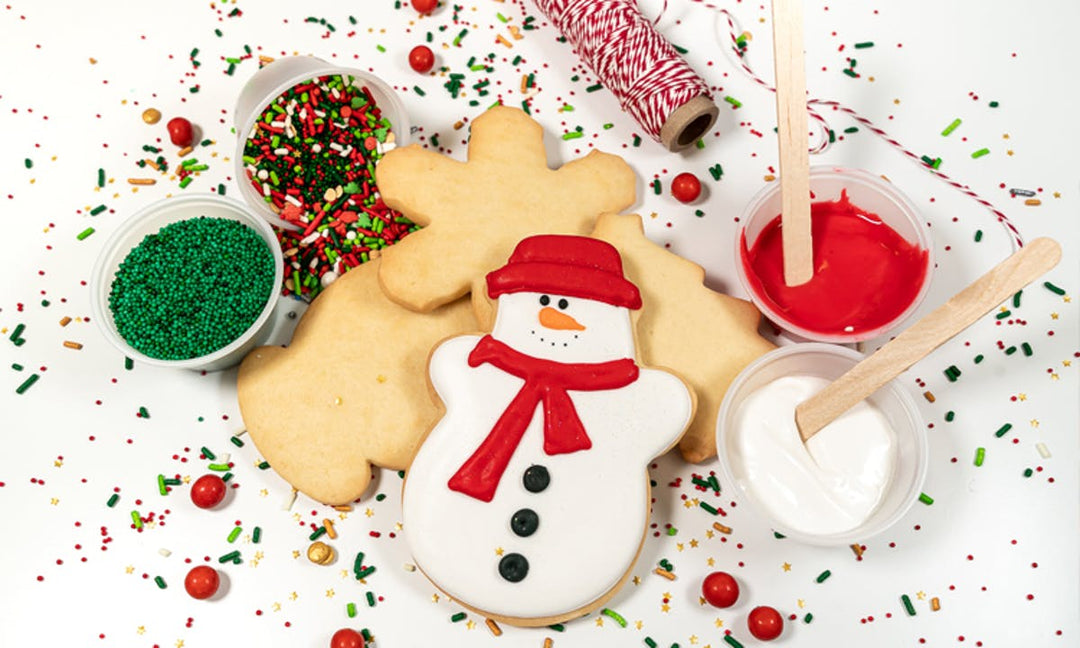 Christmas cookie decorating kit with snowman icing and sprinkles