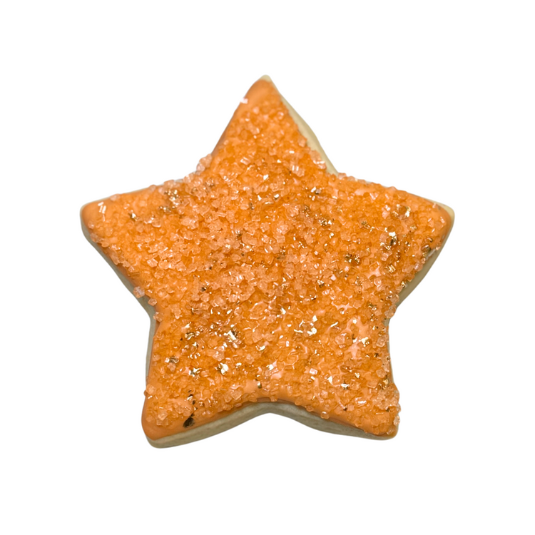 Life of a Dough Girl star-shaped cookie with orange sugar.