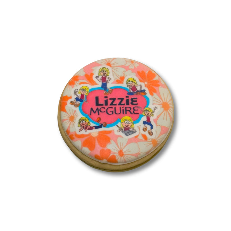 Lizzie McGuire cookie with orange floral icing design