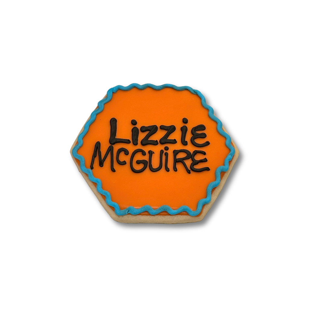 Hexagonal Lizzie McGuire cookie with orange icing and blue border.