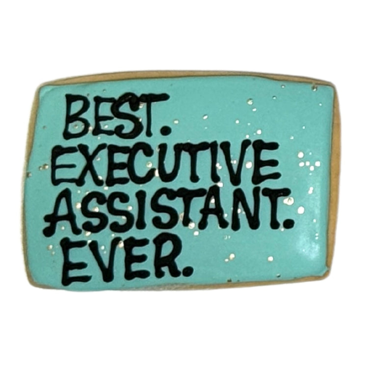 Rectangular cookie with teal icing and Best Executive Assistant Ever text.