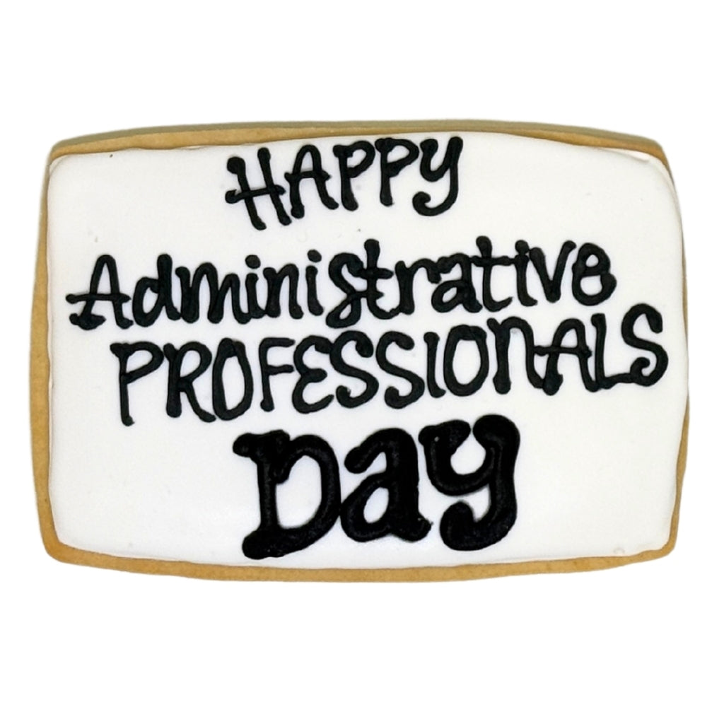 Rectangular cookie with white icing and black text.