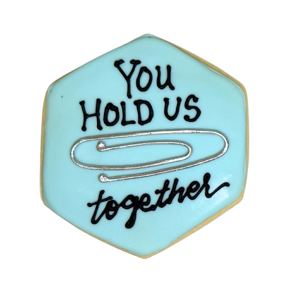 Hexagonal Admin Professionals Week cookie with paperclip design.