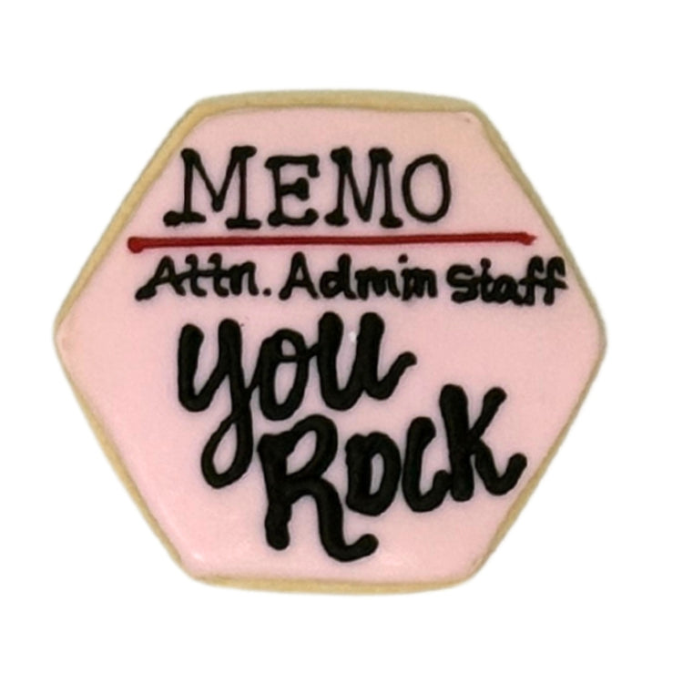 Hexagonal Admin Professionals Week cookie with pink icing.