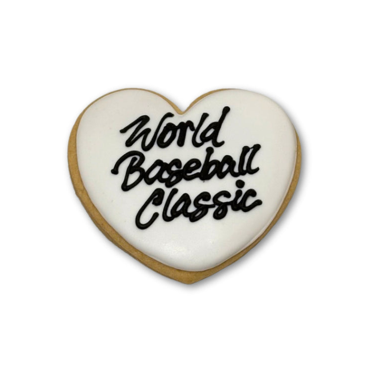 Heart-shaped World Baseball Classic cookie with white icing.
