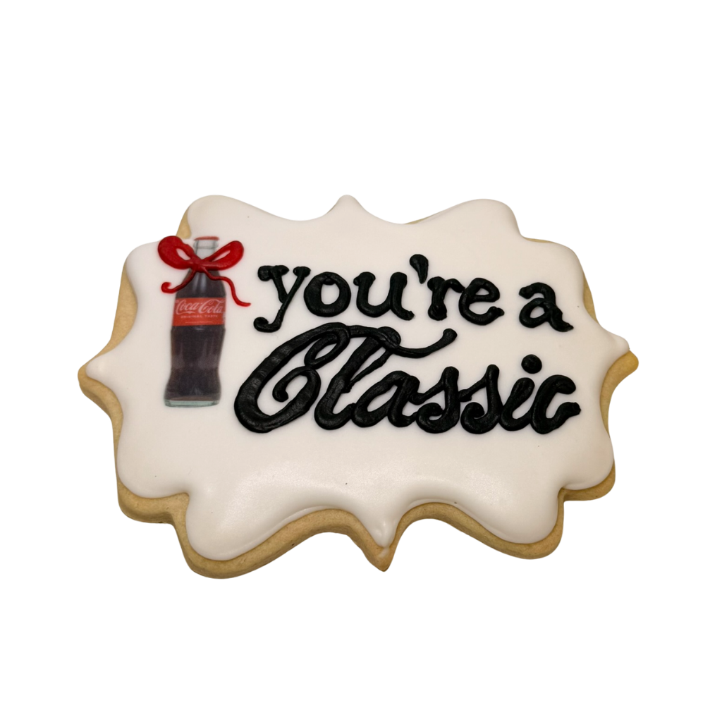 Boss's Week cookie with You're a Classic text and soda bottle.