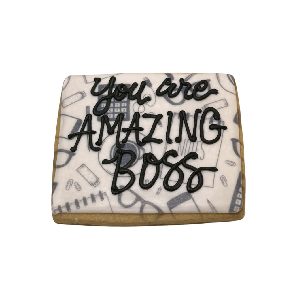 Square Boss's Week cookie with office supply print and icing.