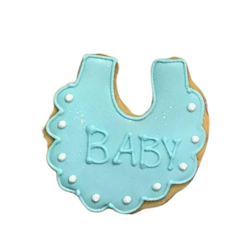 Baby boy bib cookie with light blue icing and white dots
