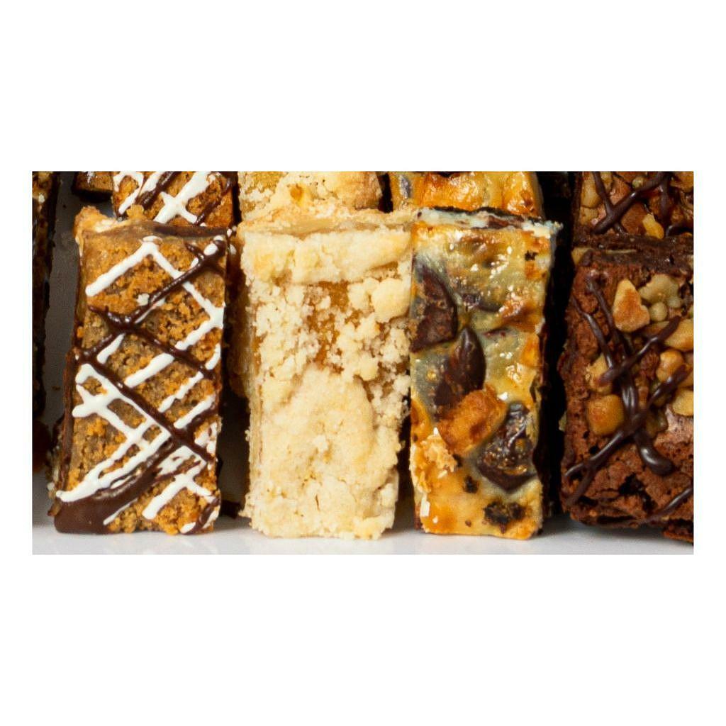Monkey Bars assorted gourmet dessert bars with drizzled toppings