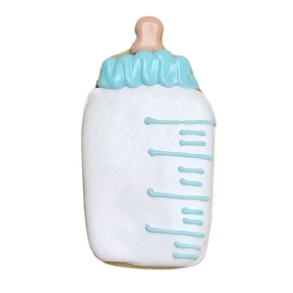 Blue bottle shaped cookie with white and blue icing.