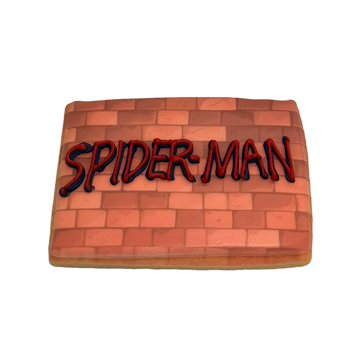 Spiderman cookie with red brick wall icing design