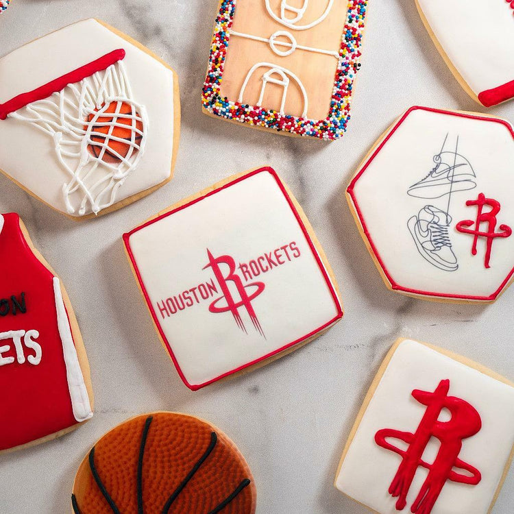 Assorted Rockets cookies with basketball-themed icing designs.