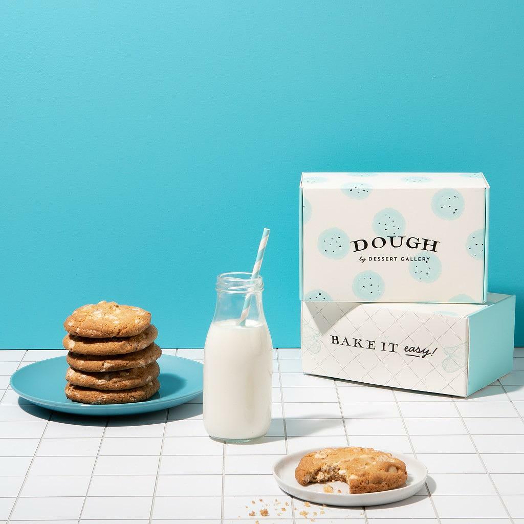 White Chocolate Macadamia Nut Dough boxes and baked cookies