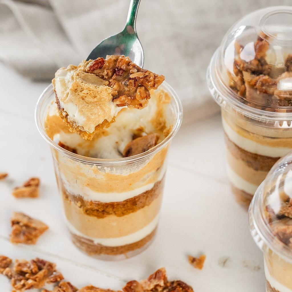 Pumpkin Dream Cake Parfait with layers in a clear plastic cup