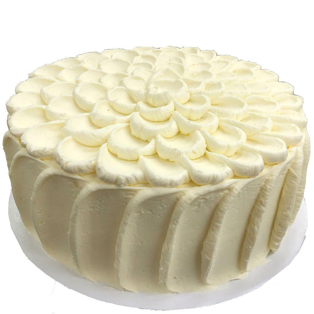 French vanilla cake with decorative petal frosting.