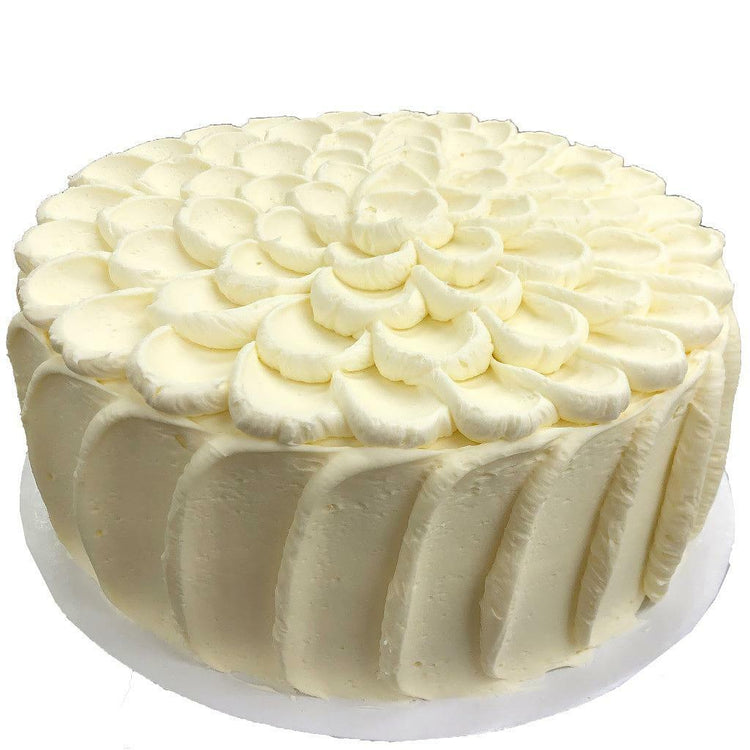 French vanilla cake with decorative petal frosting.
