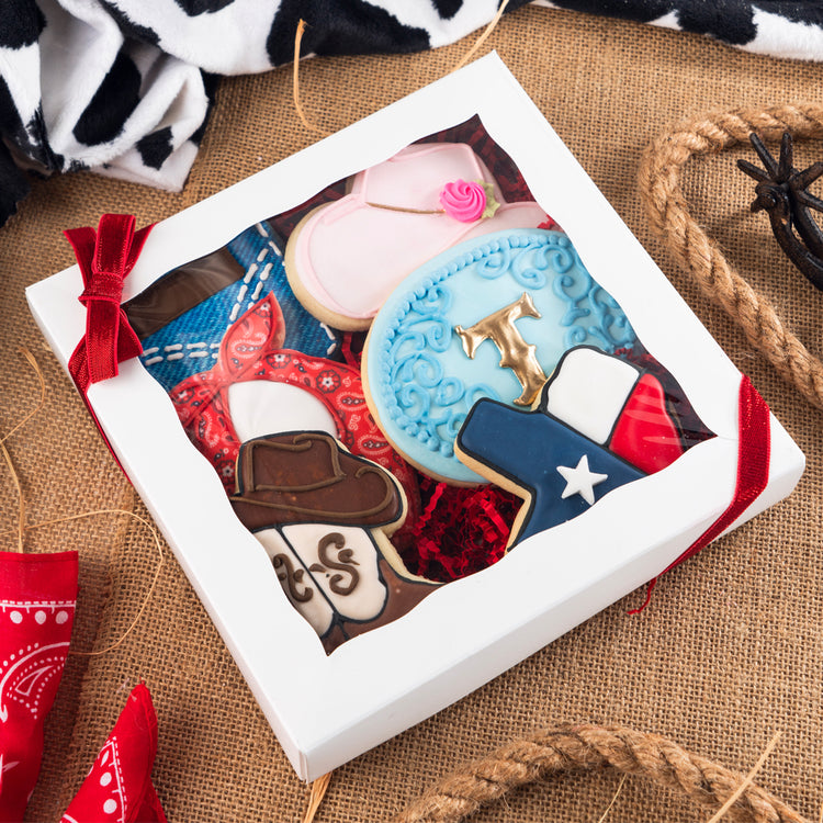 Rodeo theme gift box with decorated western-style sugar cookies