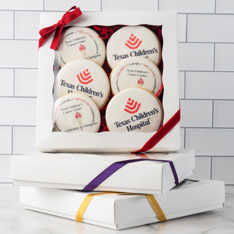 6-pack photo and logo cookies in a white gift box with red ribbon.