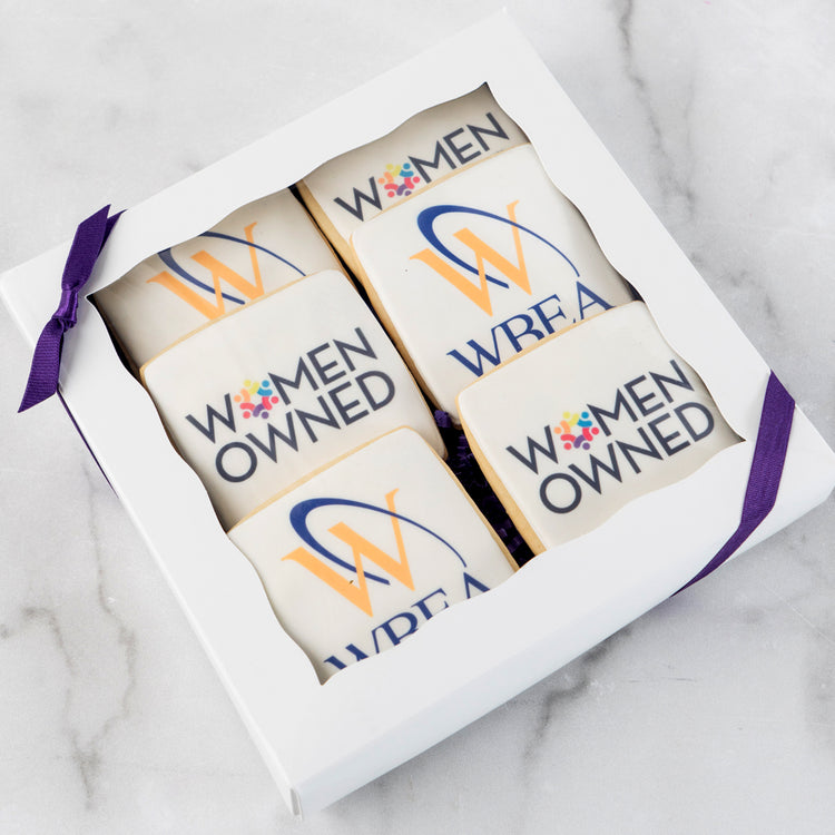 6-pack photo and logo cookies in a white gift box with purple ribbon