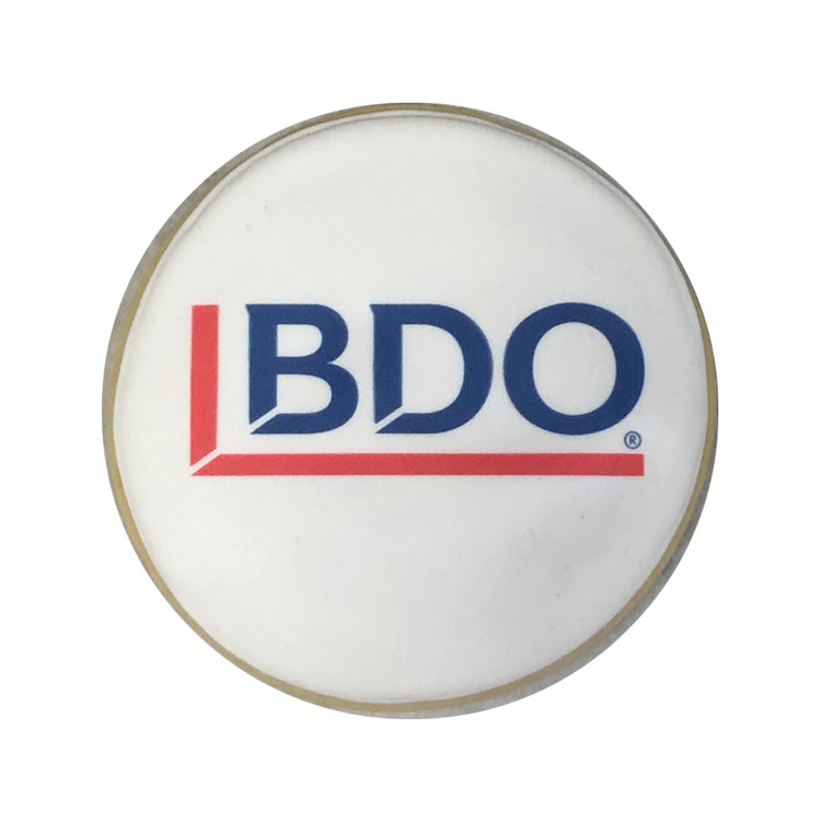 Round sugar cookie with a printed BDO logo on white icing.