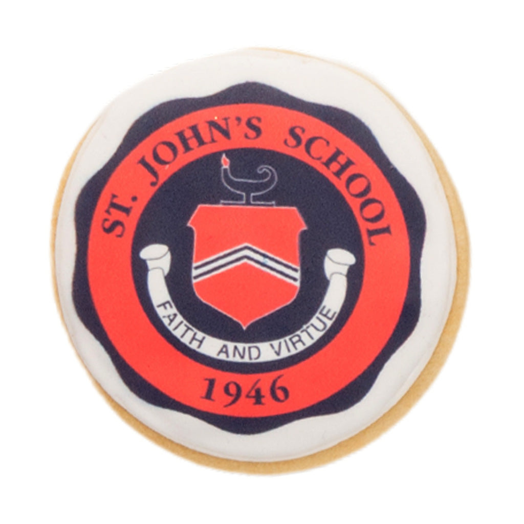 Round graduation cookie with St. John's School logo.