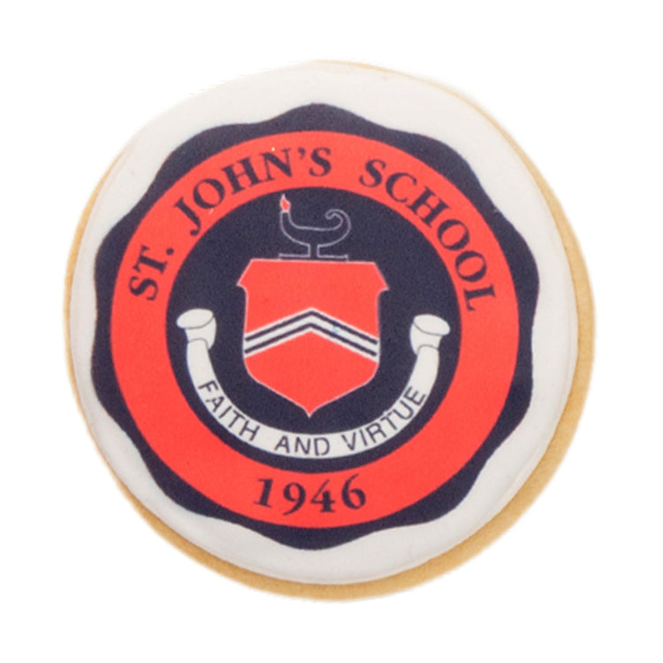 Round graduation cookie with St. John's School logo.