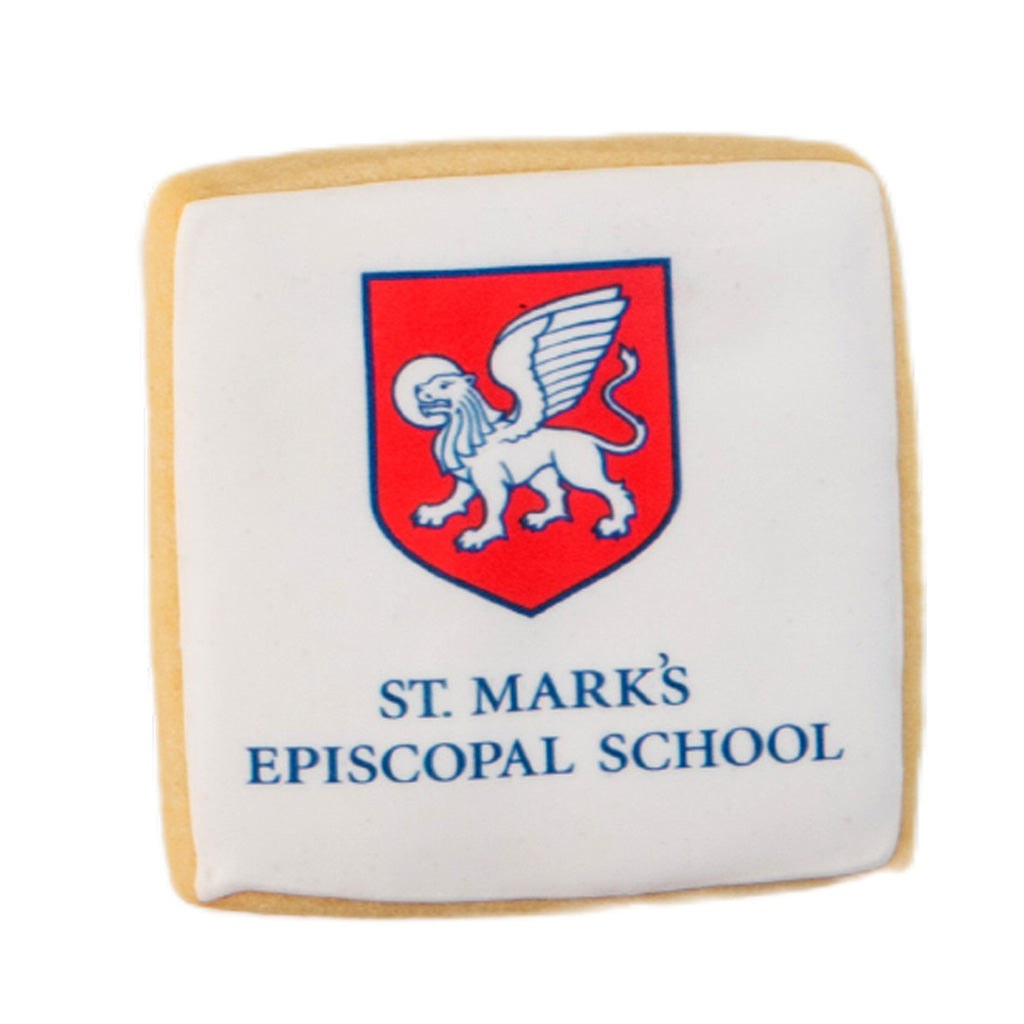 Square graduation cookie with St. Mark's school logo icing.