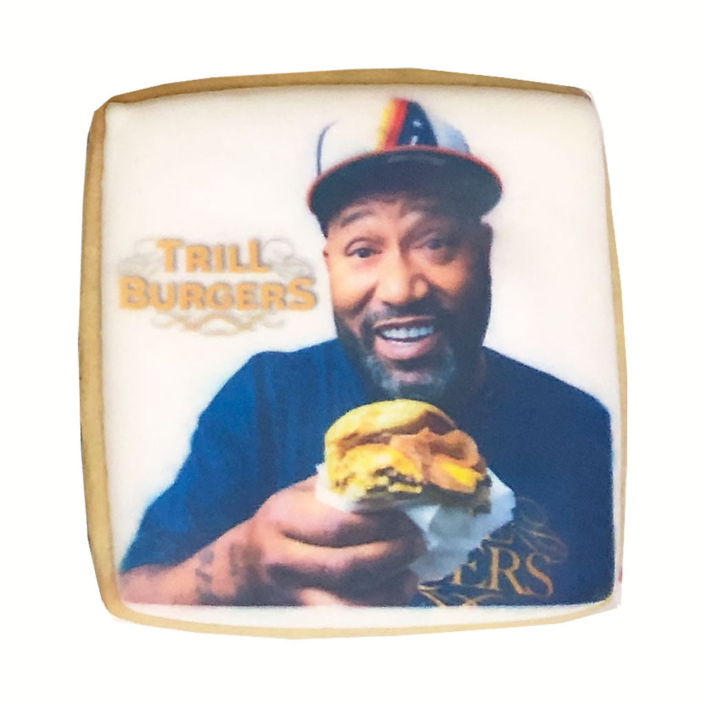 Square photo cookie featuring a Trill Burgers logo and man.