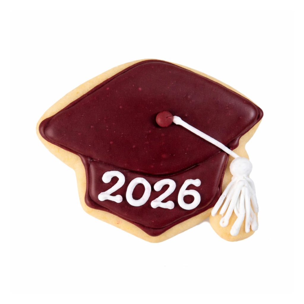 Graduation cap cookie with maroon icing and 2026 text