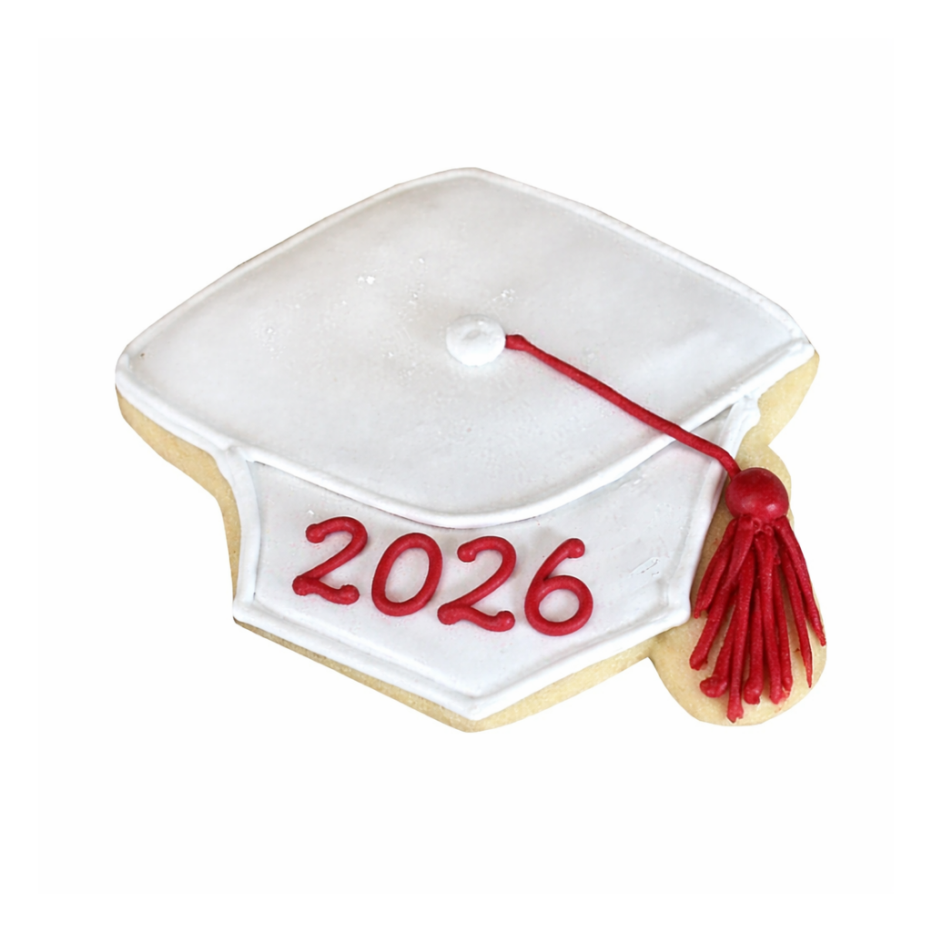 Graduation cap cookie with white icing and red 2026 tassel.