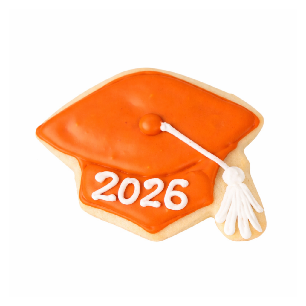 Graduation cap cookie with orange icing and 2026 text.