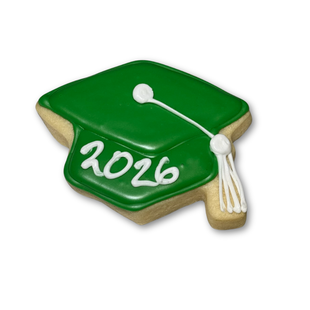 Green graduation cap cookie with white 2026 icing.