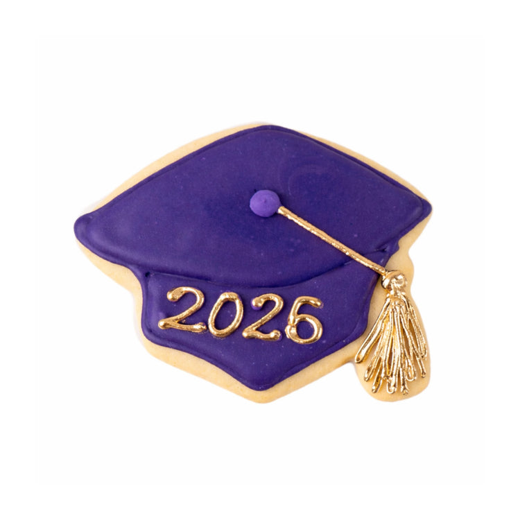 Purple graduation cap cookie with gold 2026 and tassel.