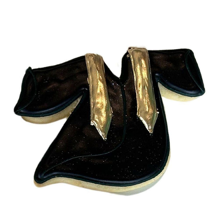 Graduation gown cookie with black icing and gold accents.