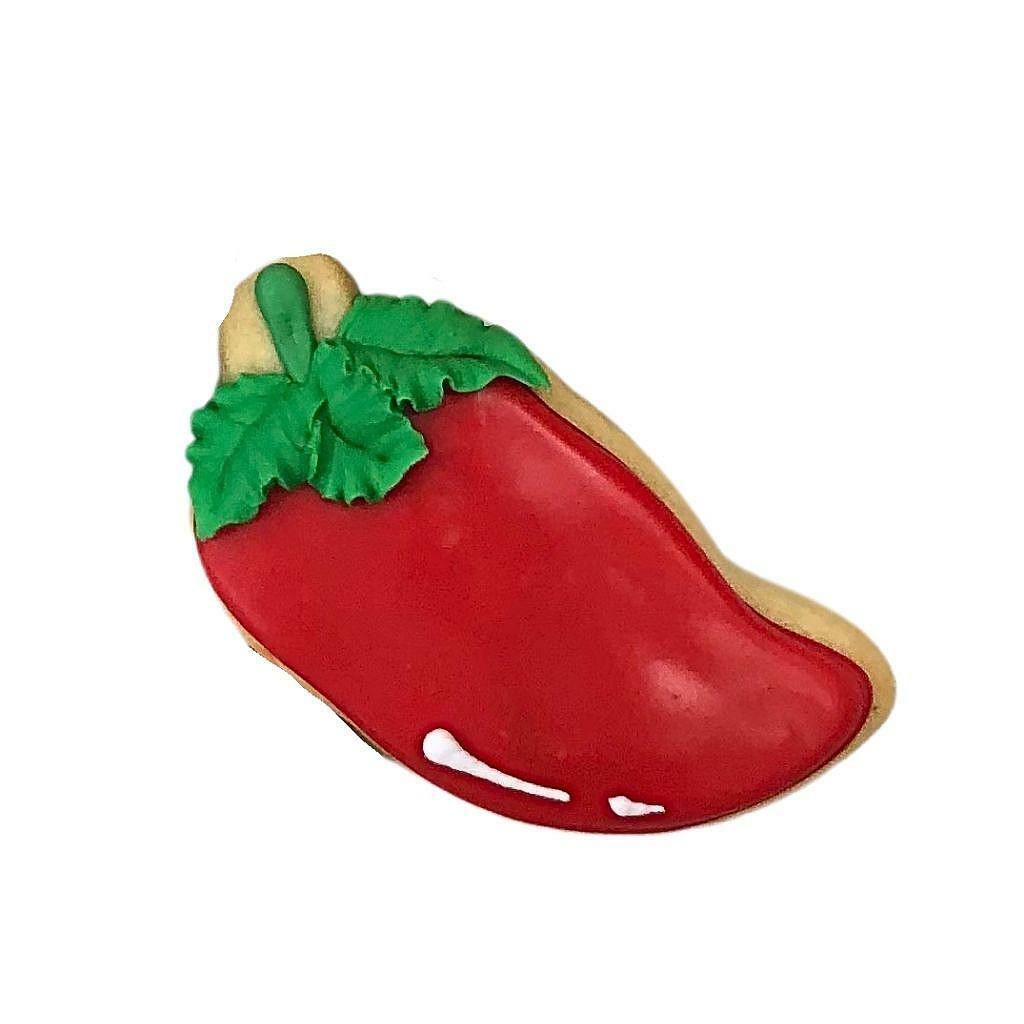 Fiesta-themed chili pepper cookie with red icing