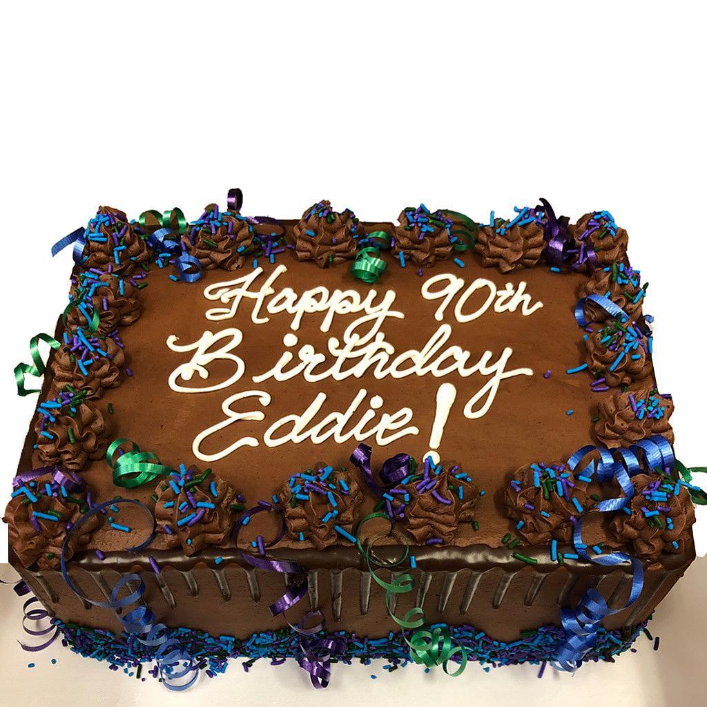 Chocolate sheet cake for a 90th birthday with blue sprinkles