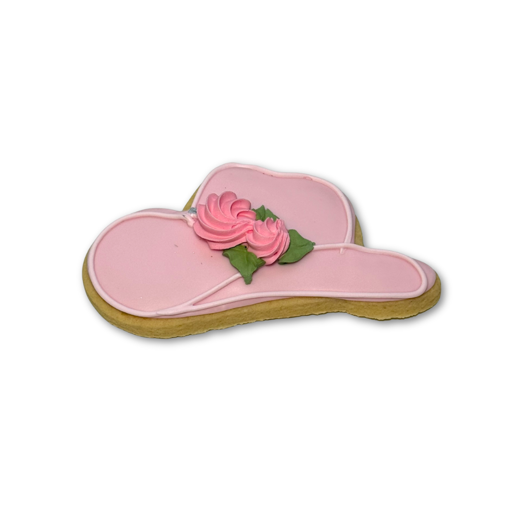 Kentucky Derby hat cookie with pink icing and rose detail.