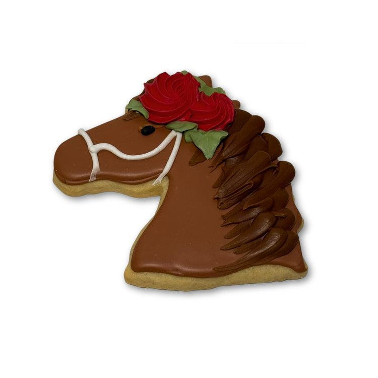 Kentucky Derby horse-shaped cookie with red rose icing.