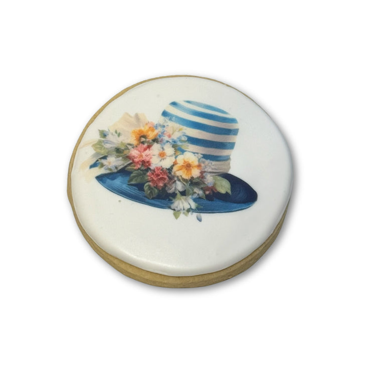 Kentucky Derby cookie with a blue striped floral hat design.