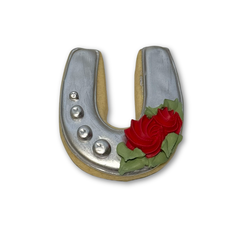 Kentucky Derby horseshoe cookie with silver icing and red roses